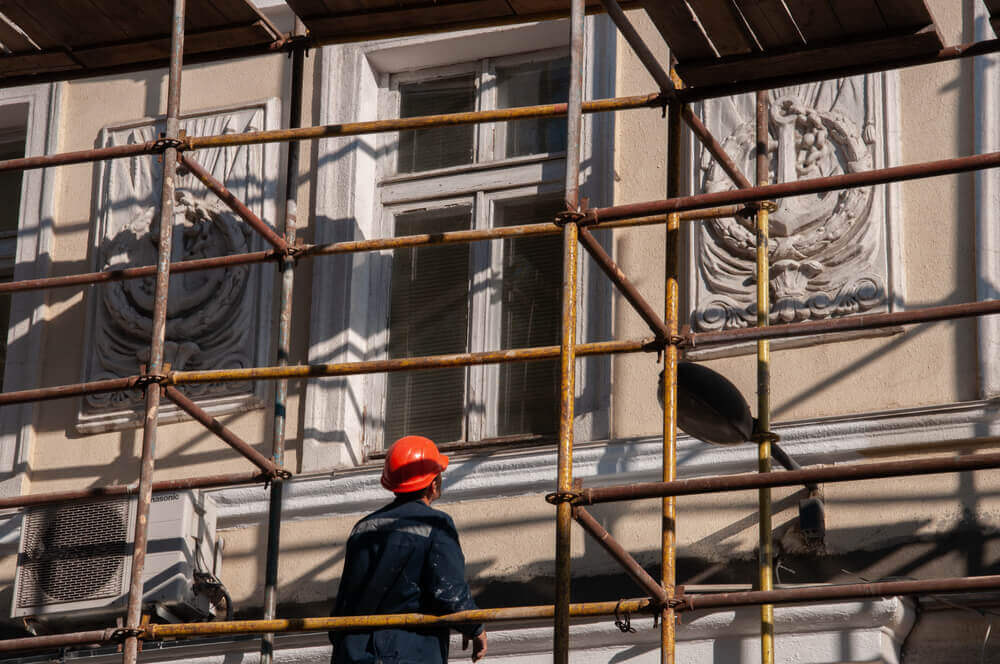 Workers renovating an old building